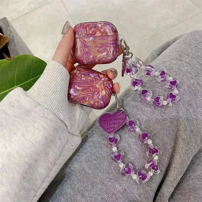 Coque AirPods 4 Coquillage Amour avec Chaîne Cœurs | VIOLETTA