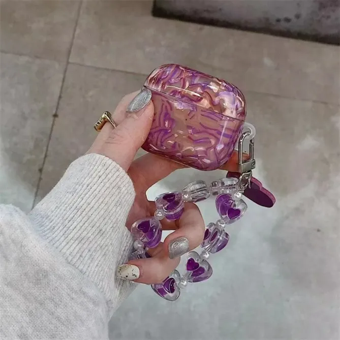 Coque AirPods 4 Coquillage Amour avec Chaîne Cœurs | VIOLETTA