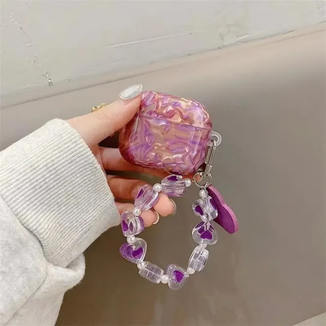 Coque AirPods 4 Coquillage Amour avec Chaîne Cœurs | VIOLETTA