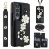 Coque Samsung Galaxy Z Fold 4 simili cuir fleurs en relief avec dragonne et lanière épaule