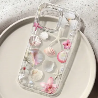 Coque iPhone 16 Plus transparente motif coquillages étoiles de mer et fleurs