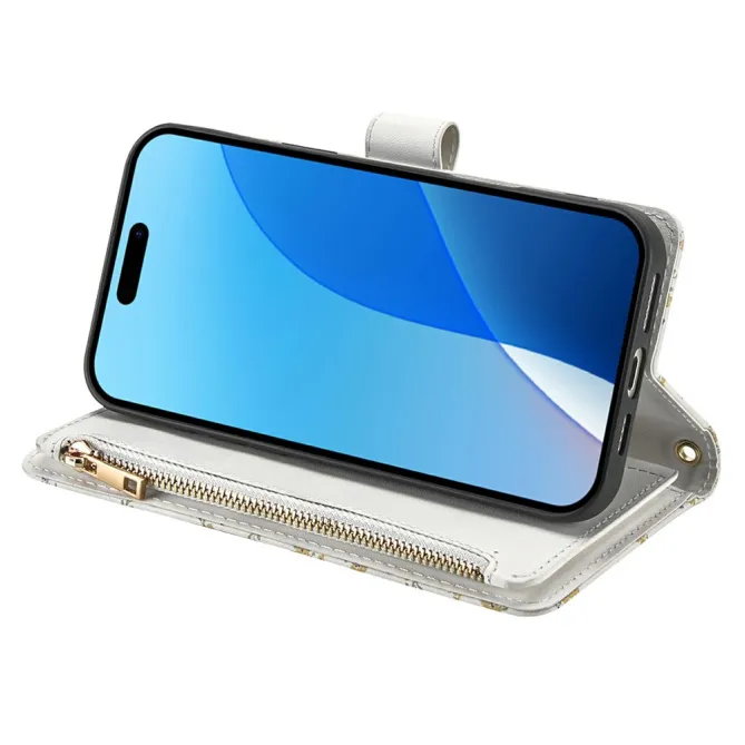 Housse iPhone 16 Plus marguerites bleues matelassé zippée avec bandoulière