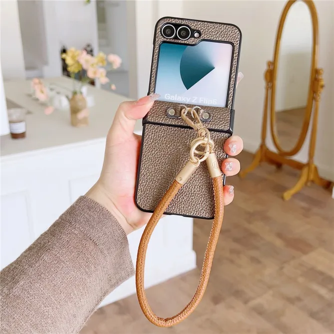 Coque Samsung Galaxy Z Flip 7 FE / Z Flip 6 Grain Litchi avec Dragonne