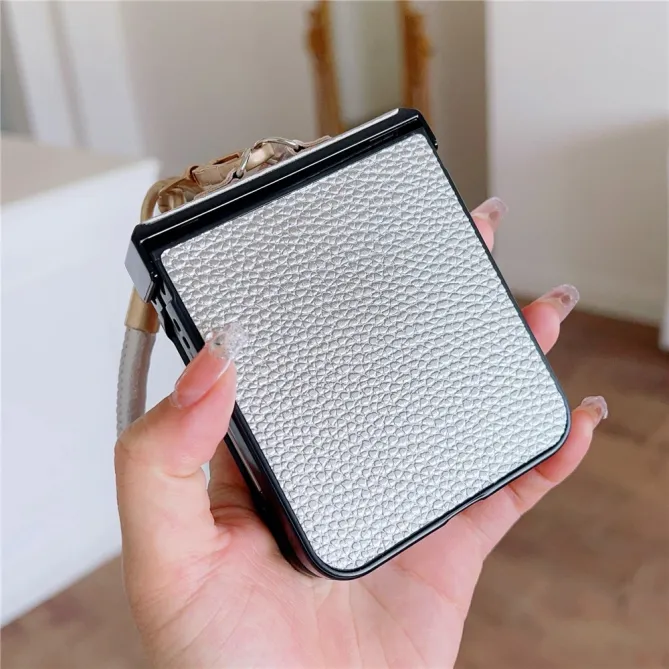Coque Samsung Galaxy Z Flip 7 FE / Z Flip 6 Grain Litchi avec Dragonne