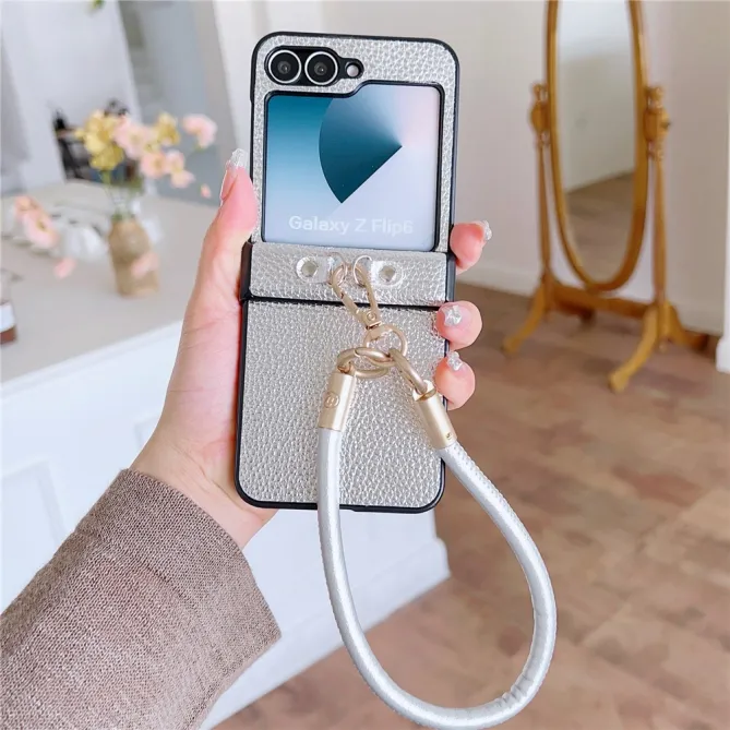 Coque Samsung Galaxy Z Flip 7 FE / Z Flip 6 Grain Litchi avec Dragonne