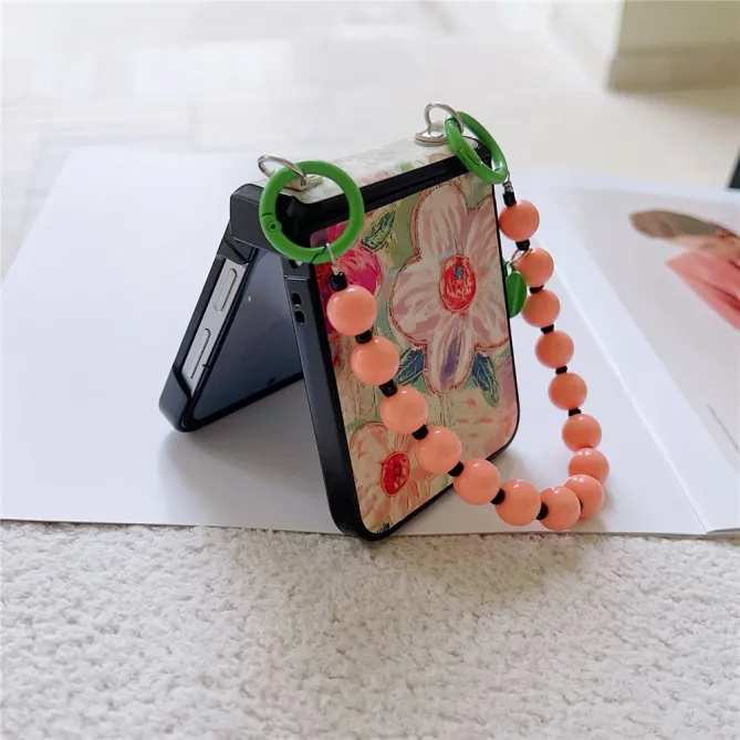 Coque Samsung Galaxy Z Flip 7 FE / Z Flip 6 Floral avec Dragonne Perles