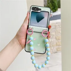 Coque Samsung Galaxy Z Flip 7 FE / Z Flip 6 Coeur avec Dragonne Perles