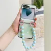 Coque Samsung Galaxy Z Flip 7 FE / Z Flip 6 Coeur avec Dragonne Perles
