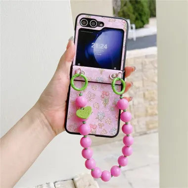 Coque Samsung Galaxy Z Flip 7 FE / Z Flip 6 Imprime Floral avec Dragonne Perles