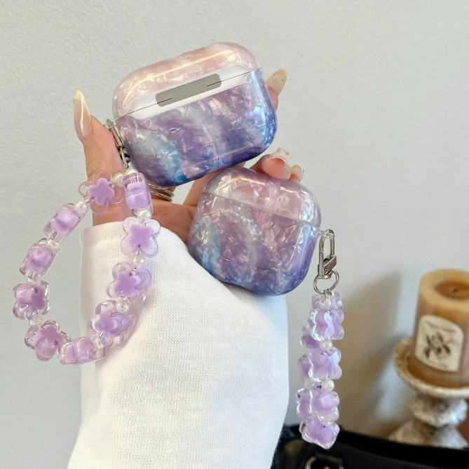 Coque AirPods Pro et Pro 2 dégradé nacré avec bracelet fleurs