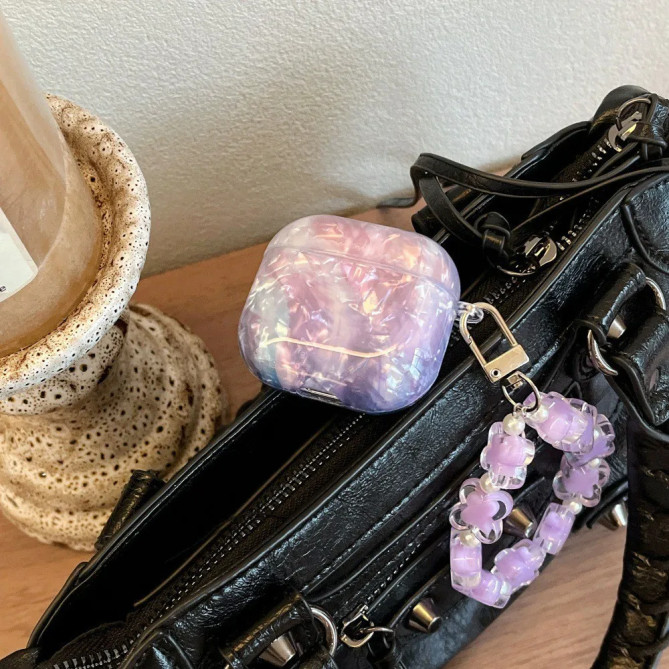 Coque AirPods Pro et Pro 2 dégradé nacré avec bracelet fleurs