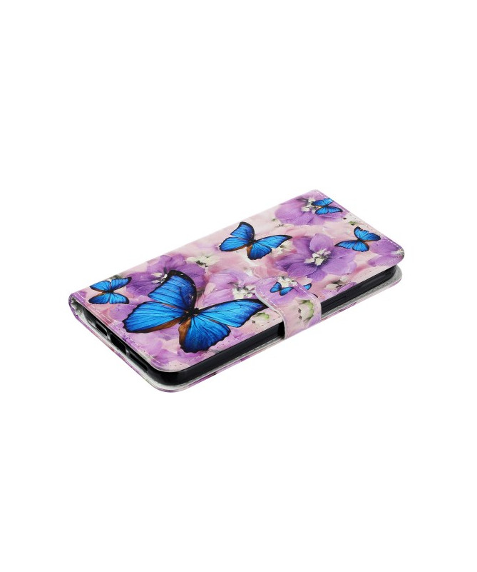 Housse iPhone 16 papillons bleus et fleurs