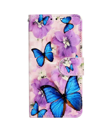 Housse iPhone 14 Pro papillons bleus et fleurs