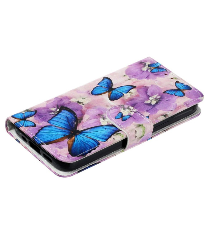 Housse iPhone 14 Pro papillons bleus et fleurs